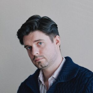 Photo of Sebastian Szyller.